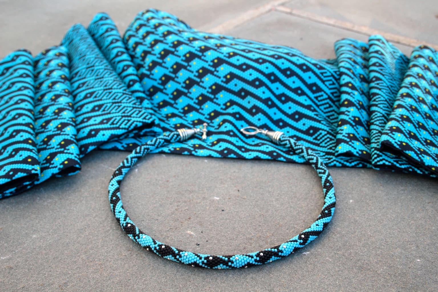 Image for entry 'Fish Transformation Necklace and Scarf'