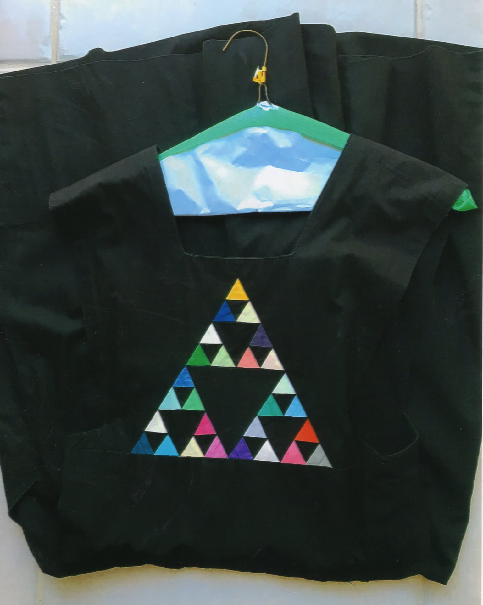 Image for look 'Blazer with approximate logarithmic spirals in the design, Jumper with Sierpinski's Triangle on the bib, Koch Curve Jumper, t-shirts with Leonardo daVinci designs embroidered'