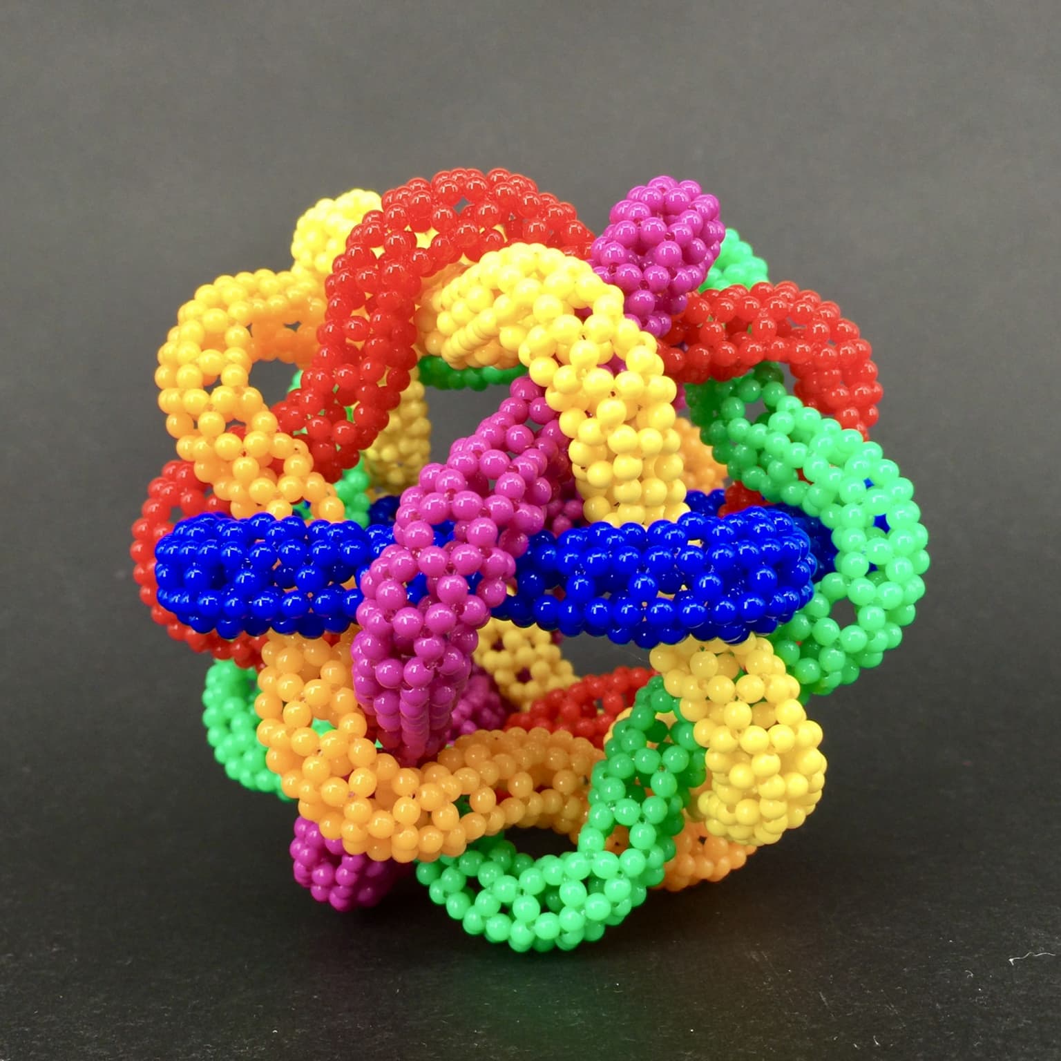 Image for entry 'Dodecahedral polylink of six star-shaped toroidal carbon nanotubes'