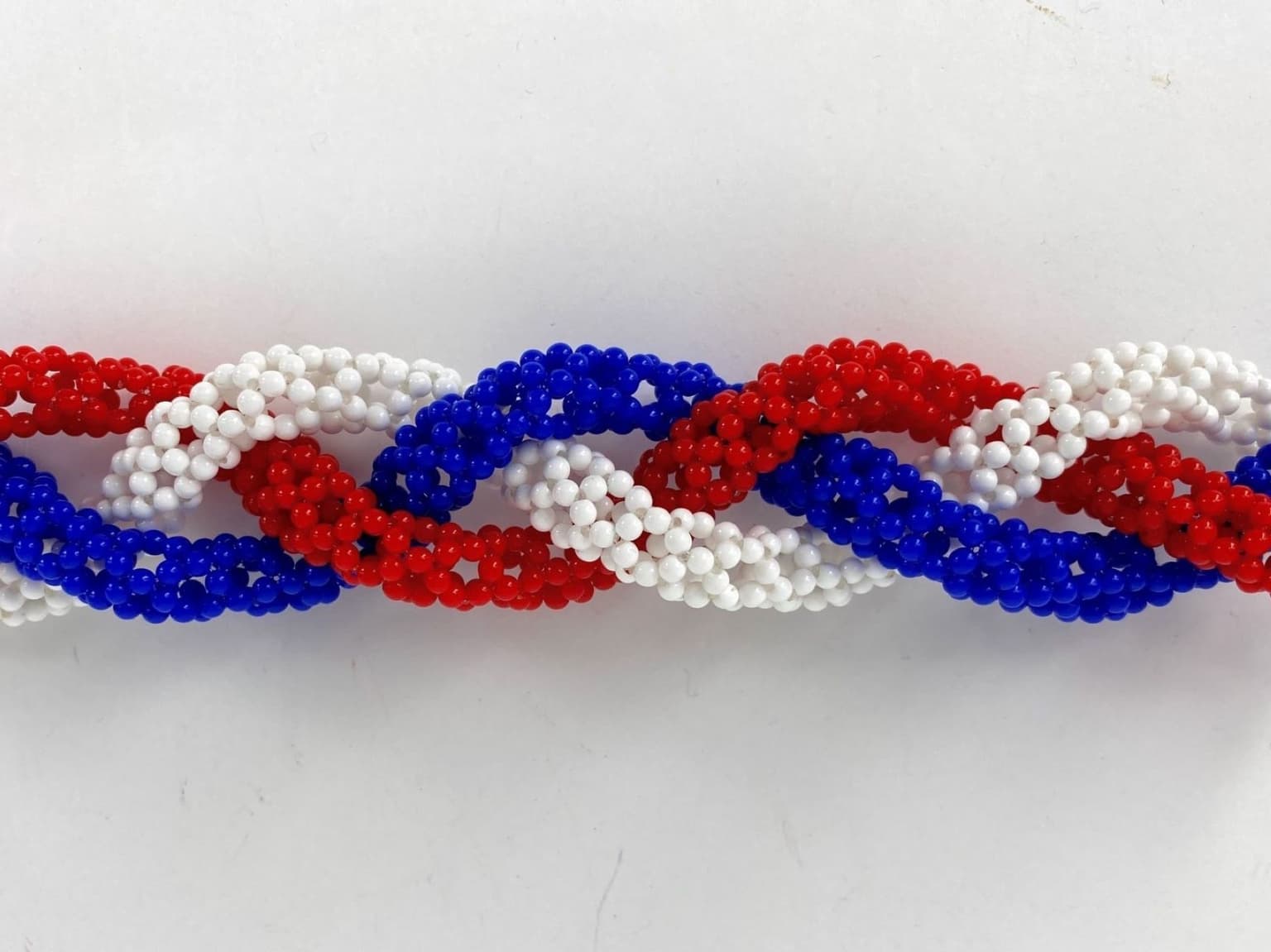 Image for entry 'Blue white red carbon nanobraid'