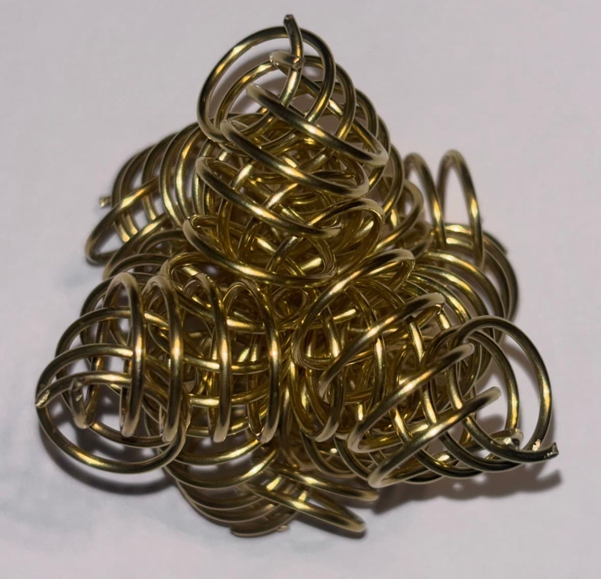 Image for entry 'Triple-link Borromean tetrahedron, a helical helical weave'