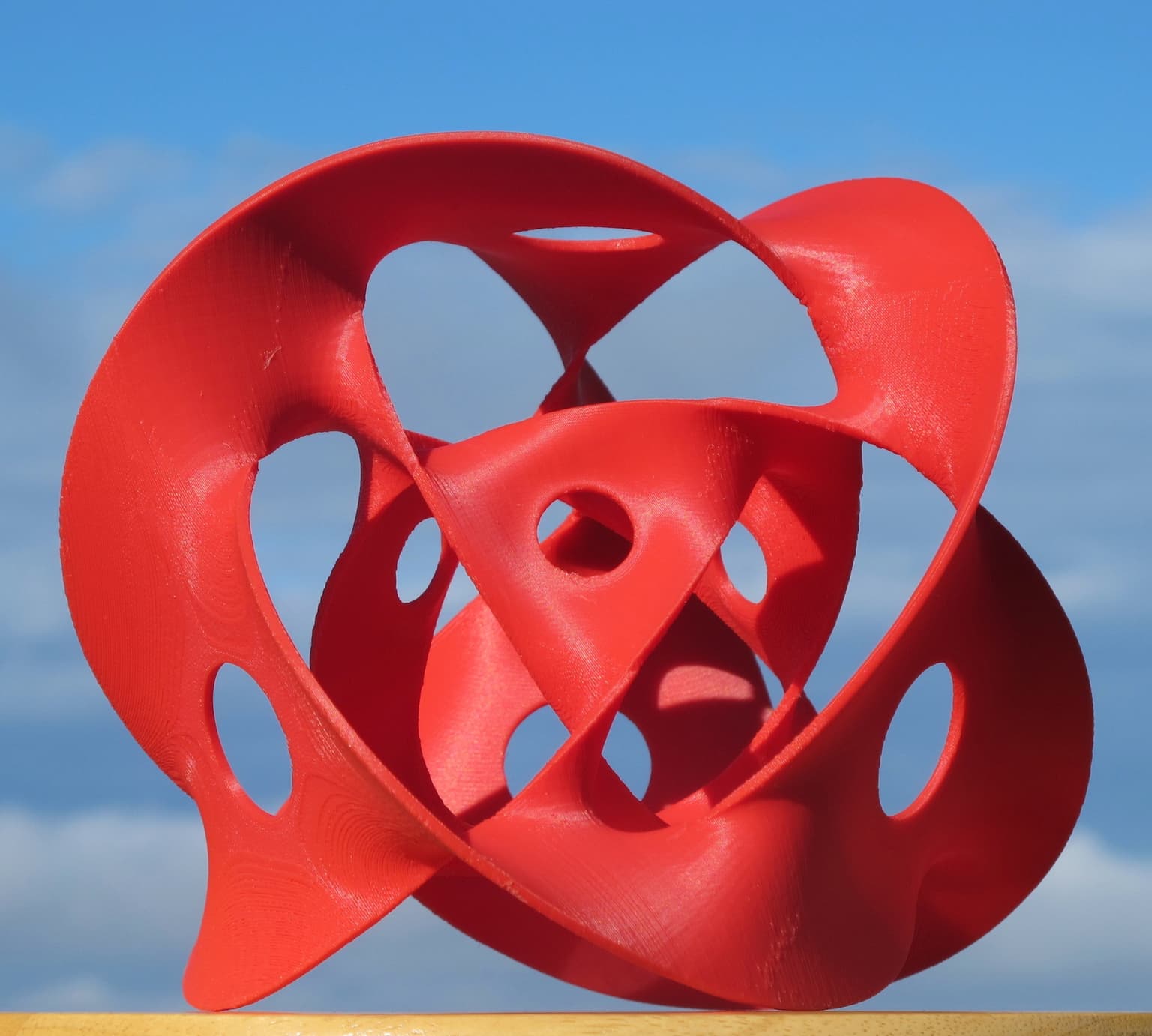 Image for entry 'Two-Level Borromean Soap Film, Suspended by Six Circles'