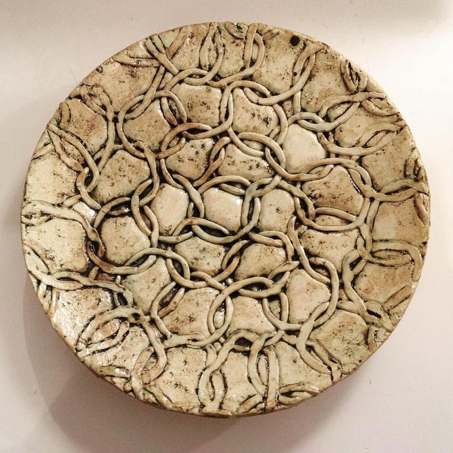 Image for entry 'White Plate with Overlapping Rings'
