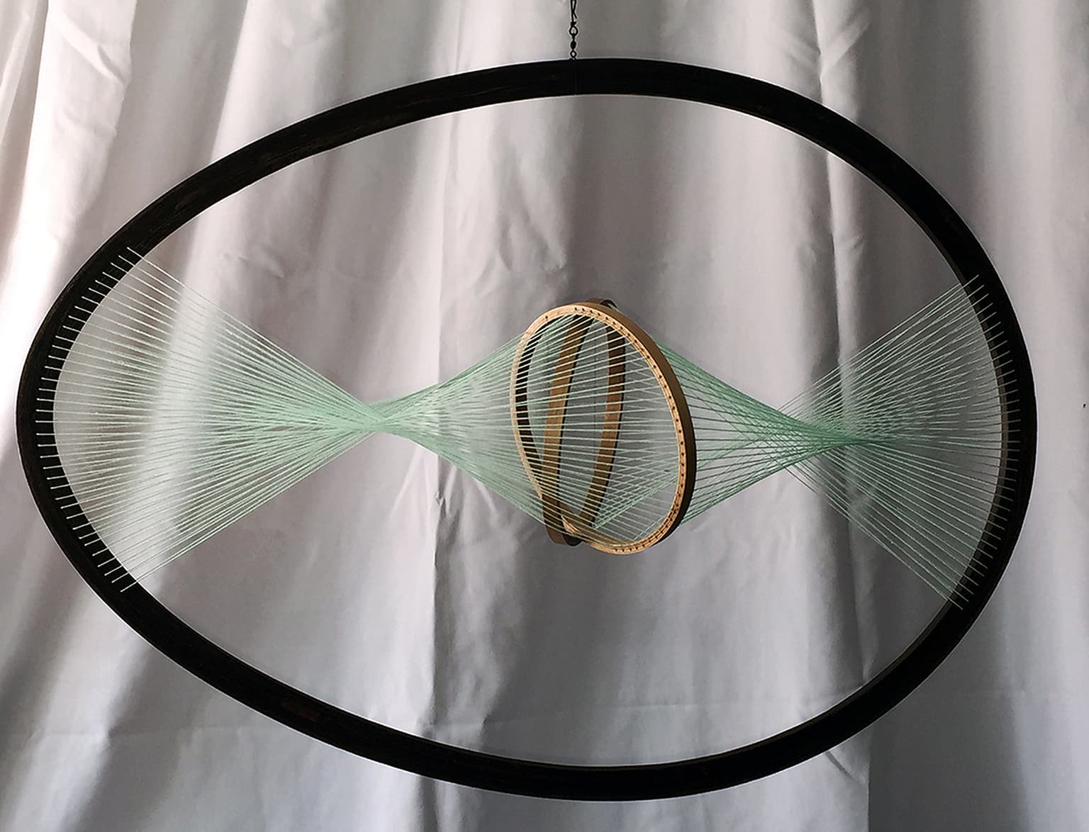Image for entry 'Interlocking Circles in Oval'