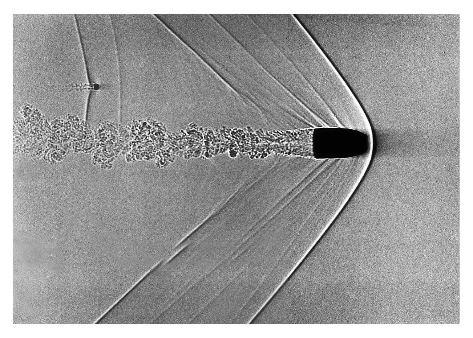 Image for entry 'Bullet at Mach 1.4 with trailing particle'