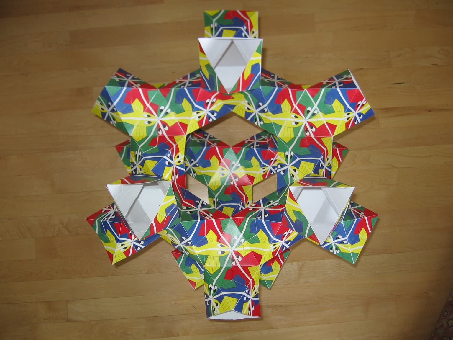 Image for entry 'The {3,8} Polyhedron with Fish'