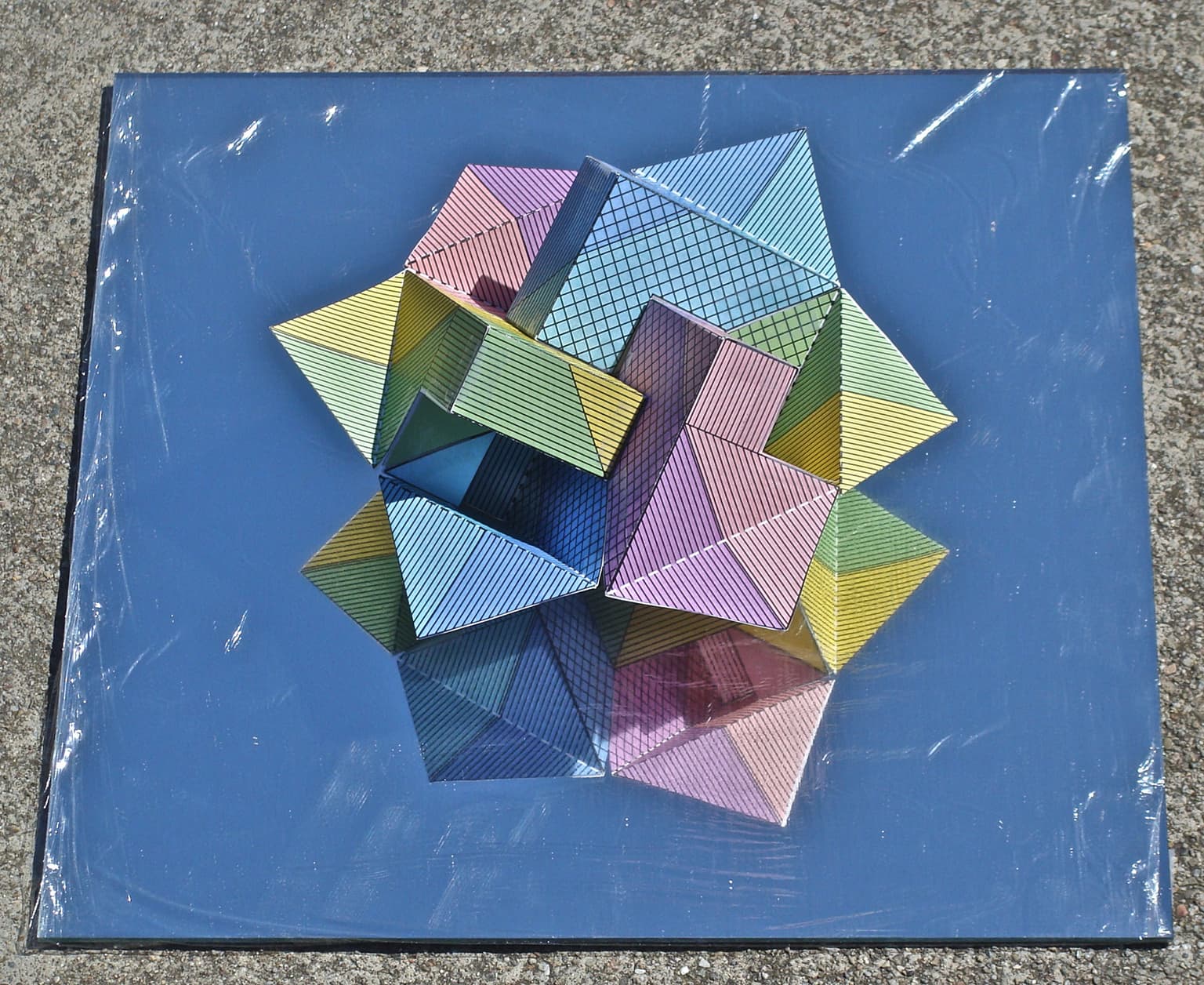 Image for entry 'Cubist Boy Cap on Mirror'