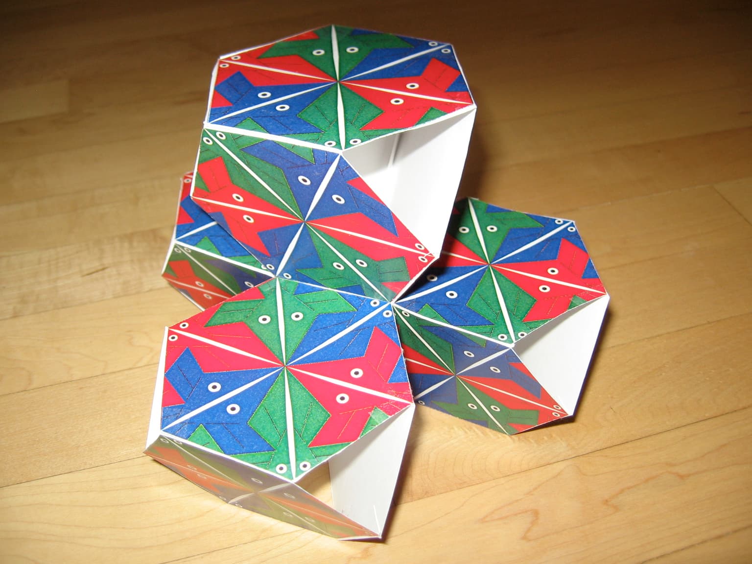 Image for entry 'Angular Fish on the [6,6|3} Polyhedron'