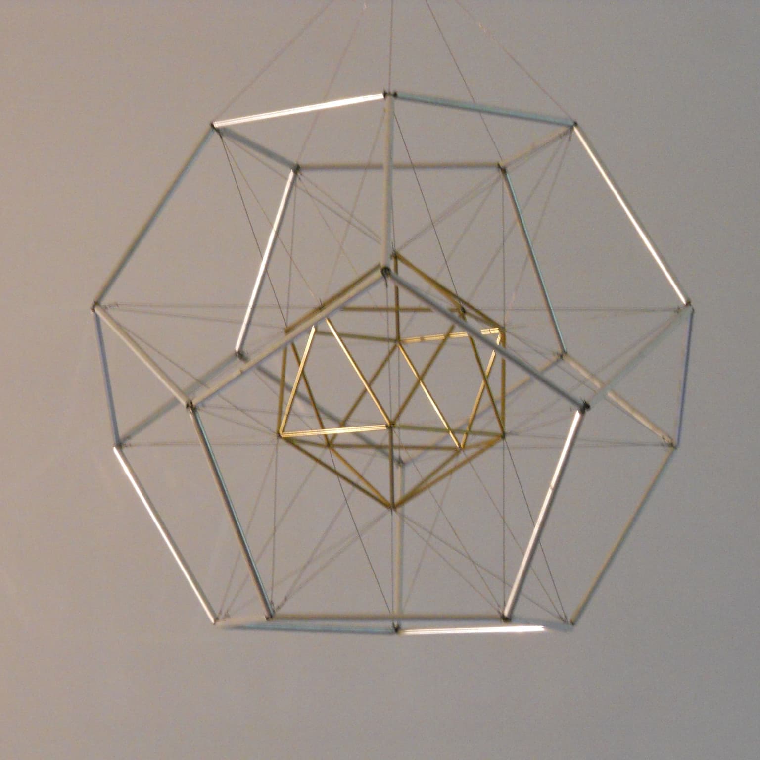 Image for entry 'Dodecahedron with Icosahedron Suspended Inside'